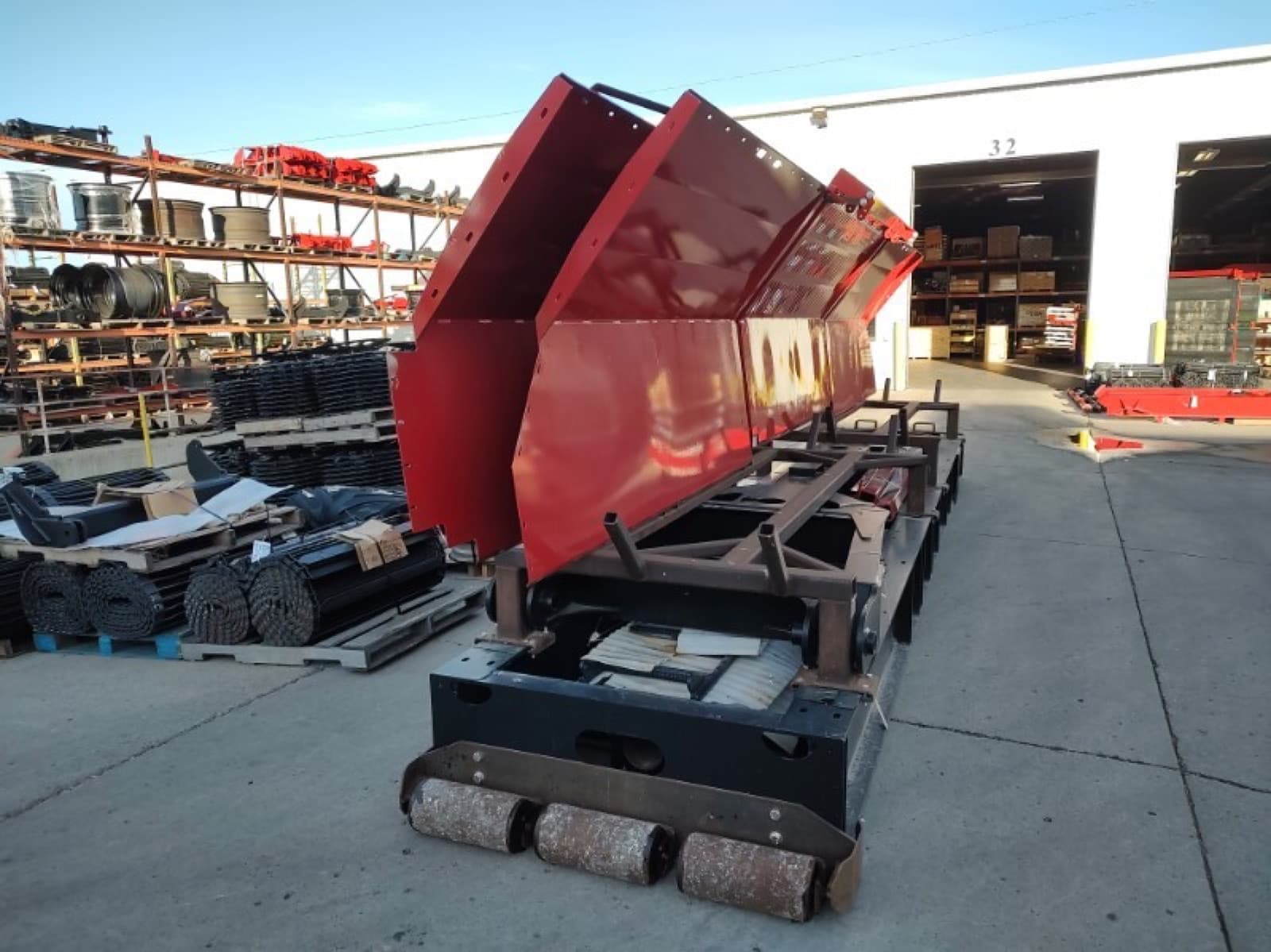 Upper body and hopper sections lifted off and set down outside on their frame