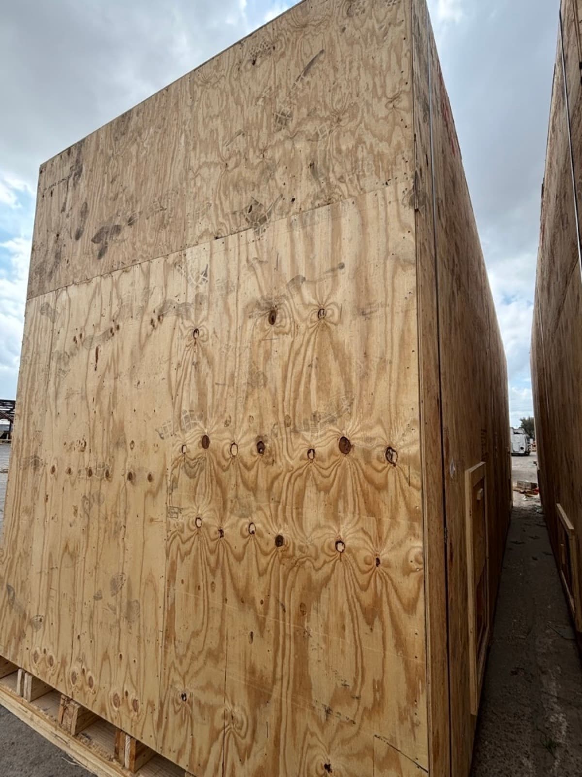 Crate wall panels closed up and nailed off along the full length