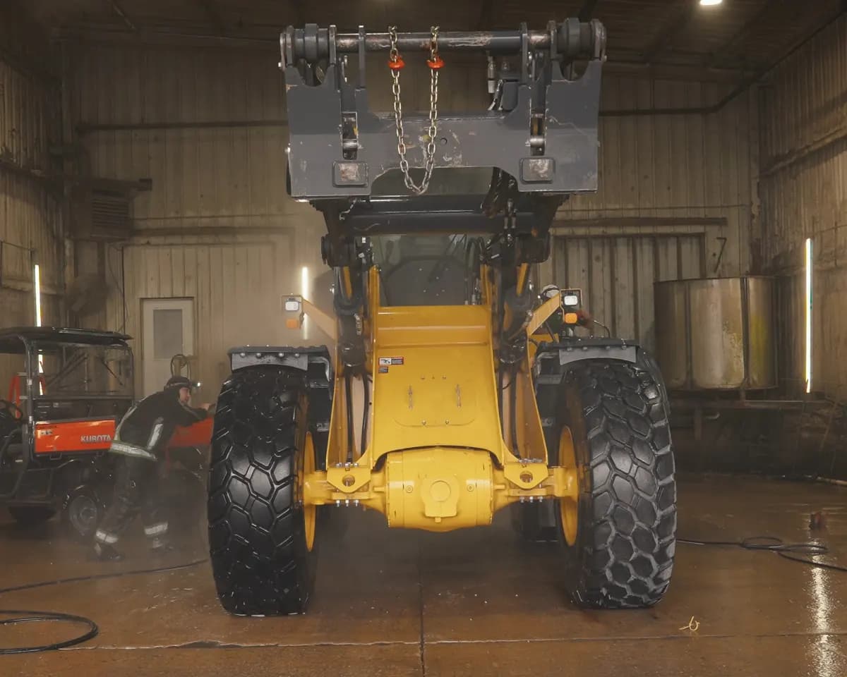 Construction equipment cleaned during phytosanitary prep.