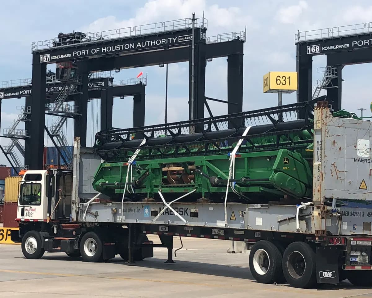 Excavator boom and stick separated during industrial dismantling services.