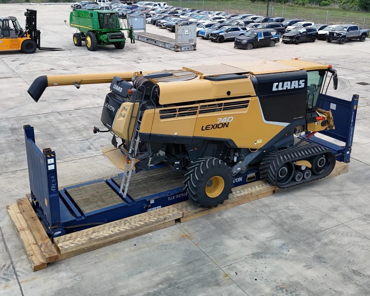 Heavy equipment staged for loading at Houston yard.
