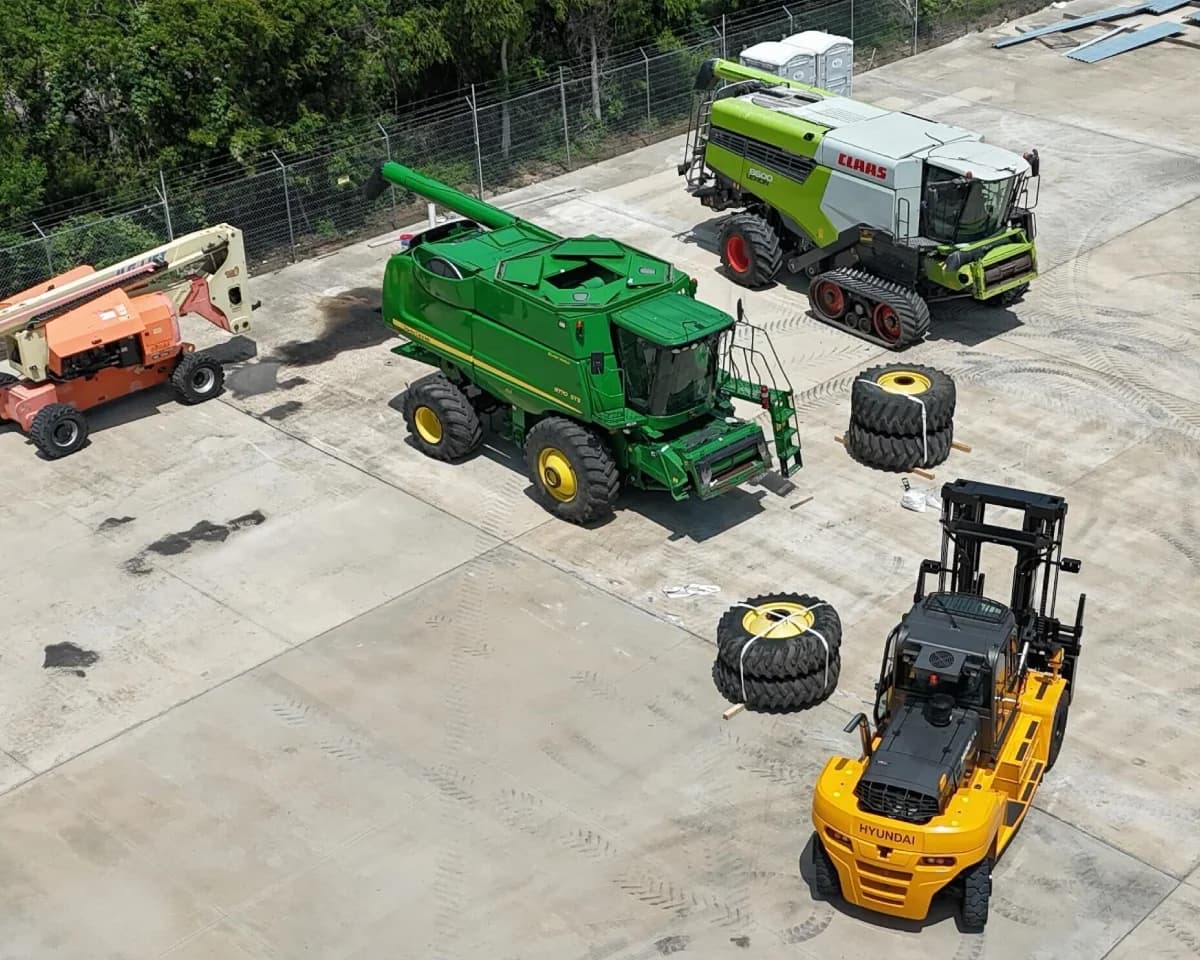 Construction equipment in temporary storage yard.