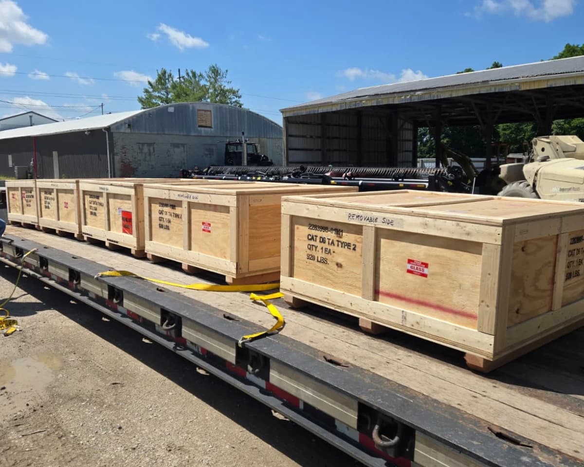 Equipment staged in the warehouse before export.