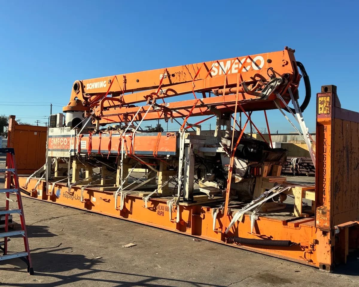 Machinery components palletized and braced for export.
