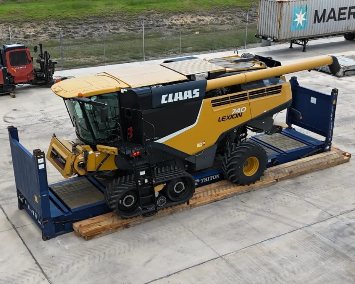 A combine harvester on a flat rack at the Houston operations hub.
