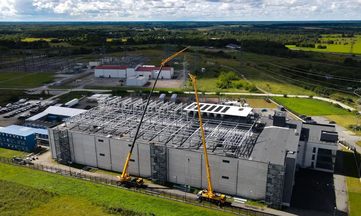 An aerial view of the yard with rows of equipment and containers.